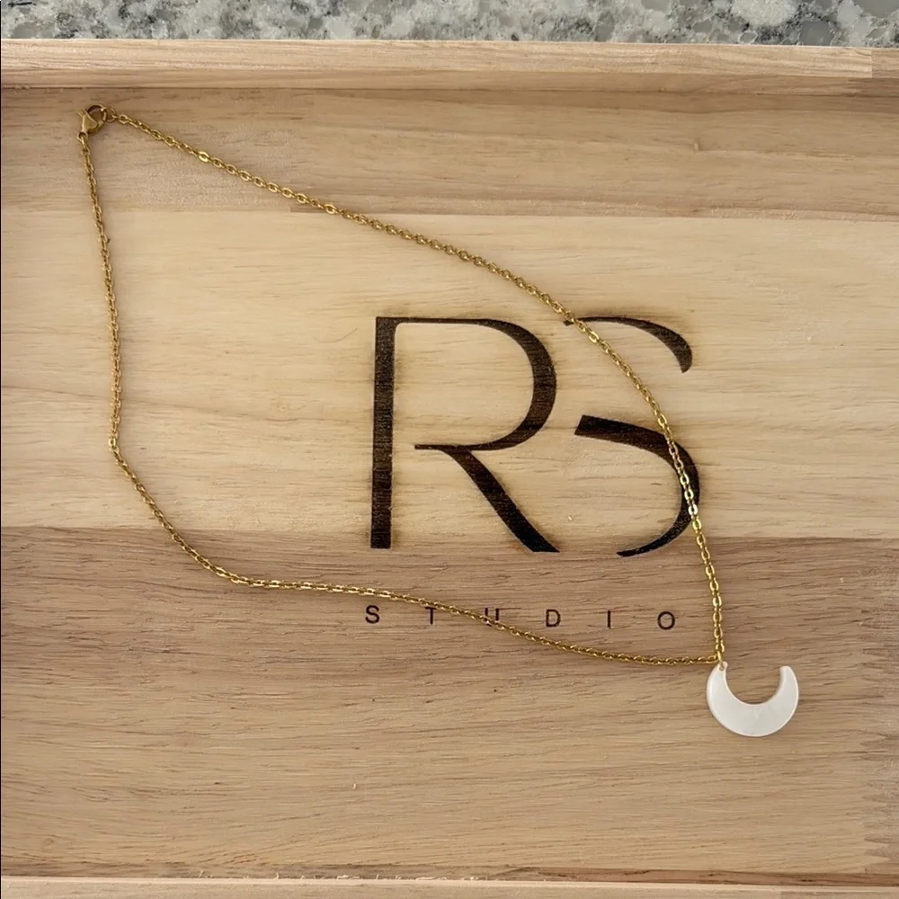 Gold Necklace with White Crescent Pendant